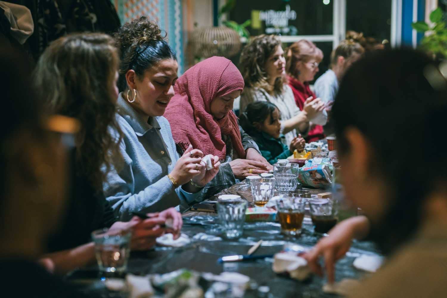 Women participating in a clay workshop